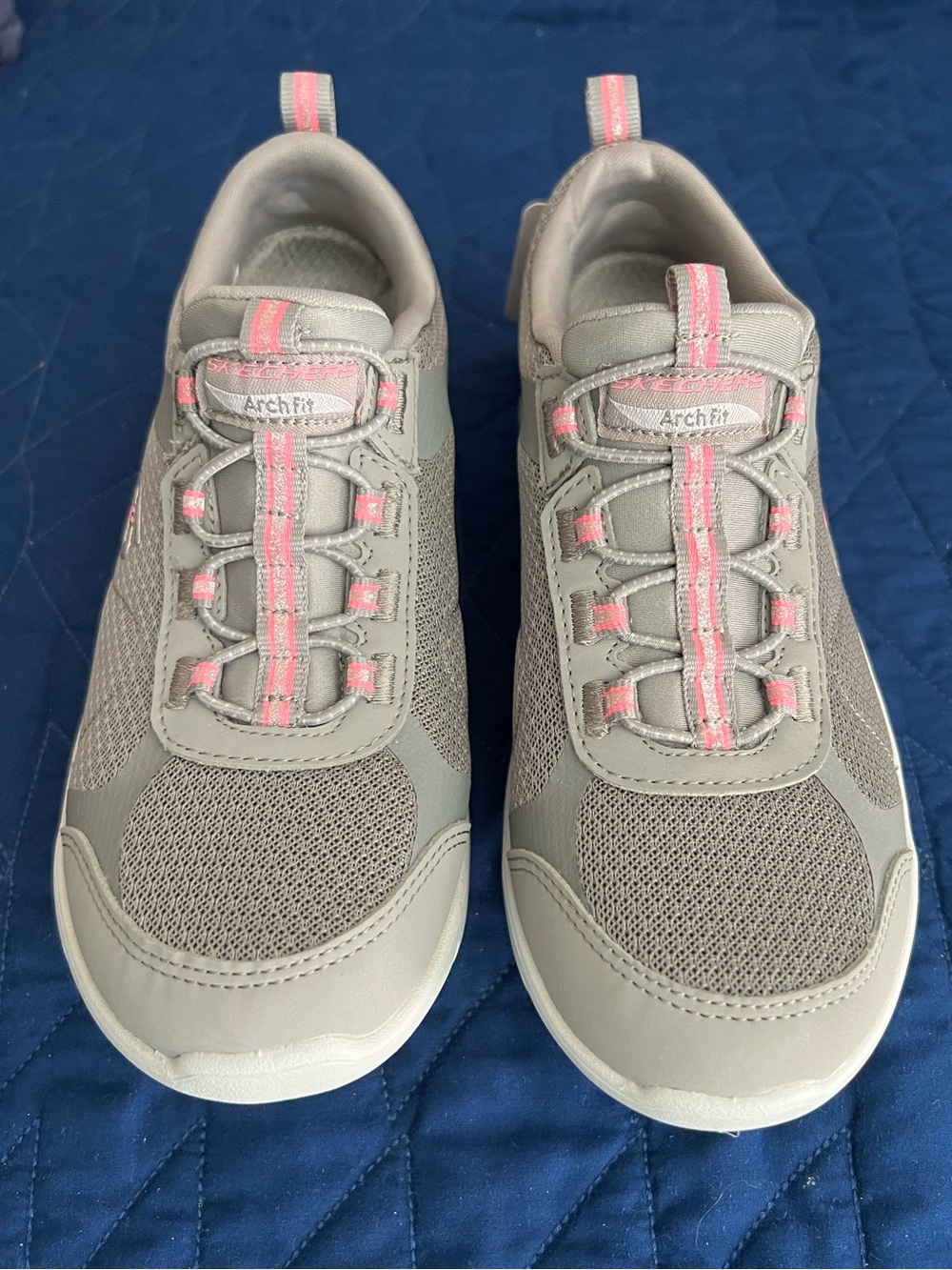 Skechers Women's Gray Slip-On Athletic Sneakers with Pink Trim